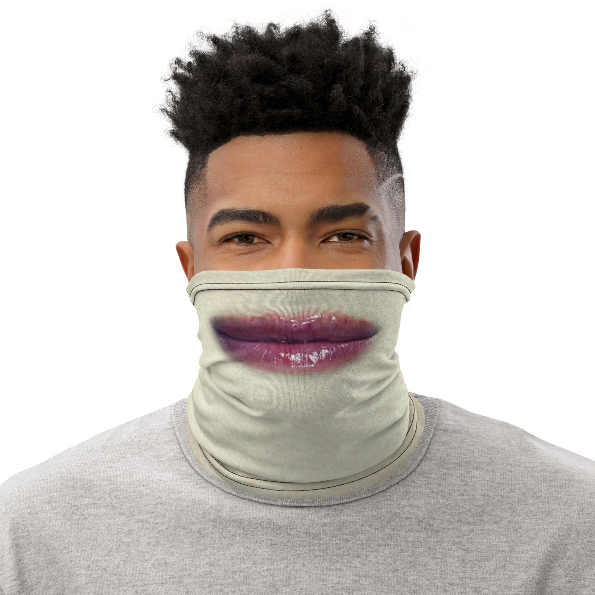 A person wearing a face mask with lipstick print, symbolizing free speech and democracy.