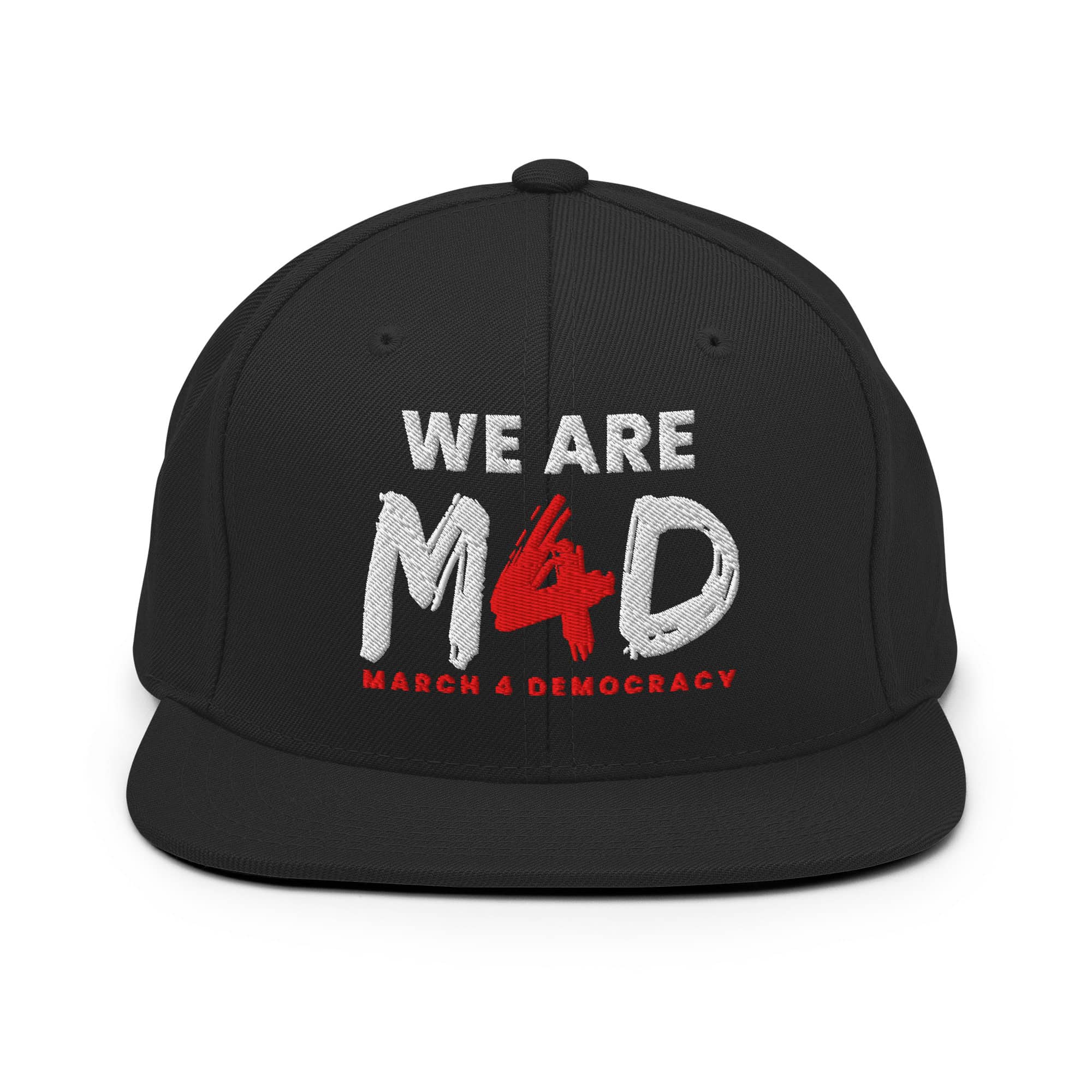 Support for democracy on a black "We Are M4D" baseball cap promoting March 4 Democracy movement.