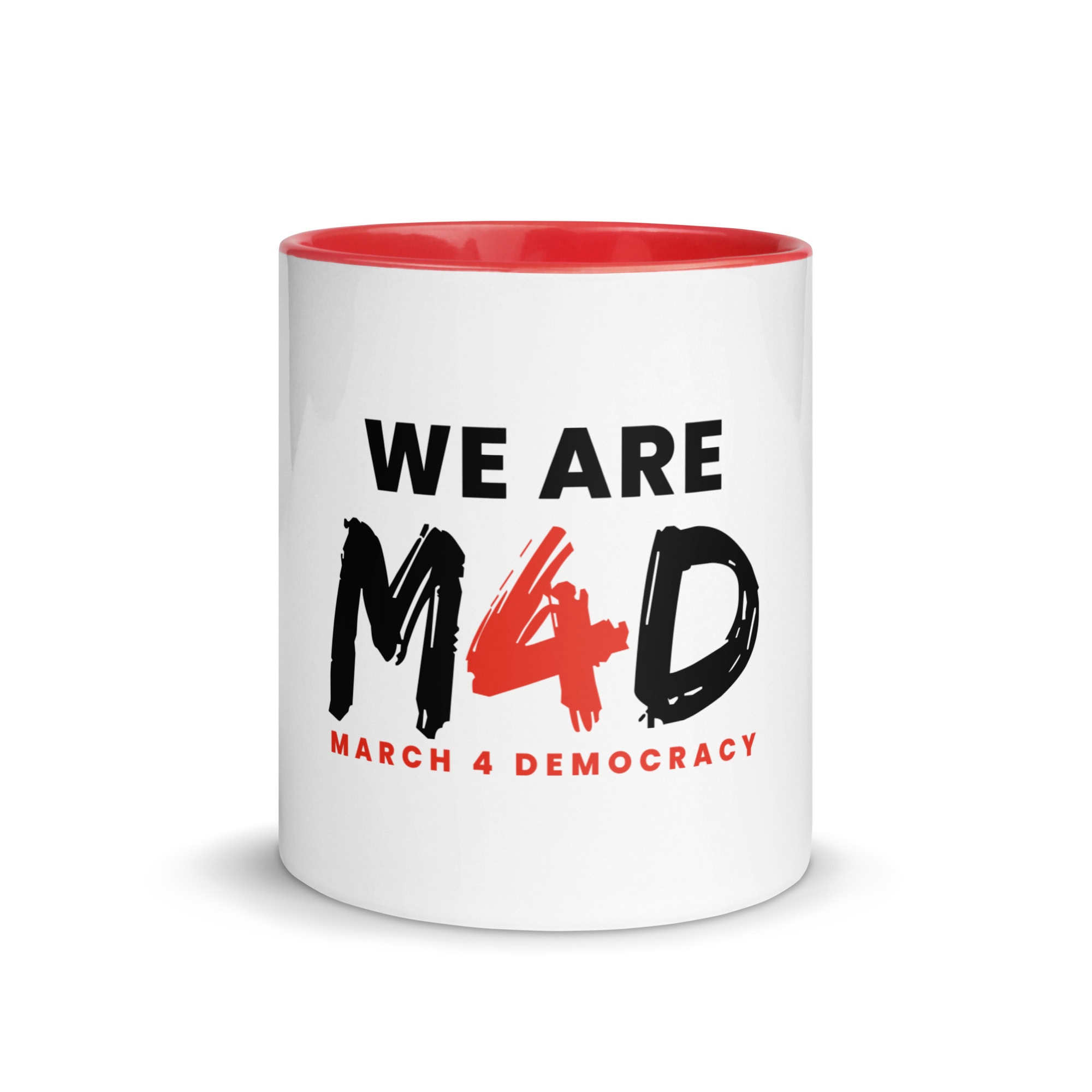 People holding a "We Are M4D March 4 Democracy" mug at a rally or event promoting democracy and voting rights.