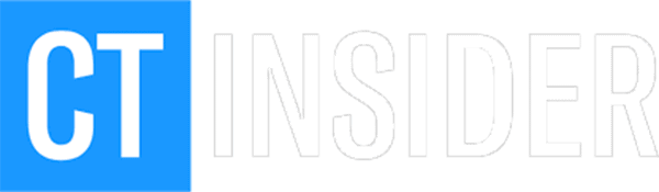 Protesters in New Haven rally against Iran strikes, demanding peace and human rights.