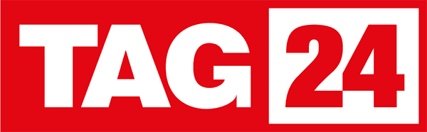 Protesters holding signs at March 4 Democracy rally advocating for voting rights and democracy.